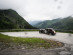 An MG negotiates hairpin bends in Switzerland