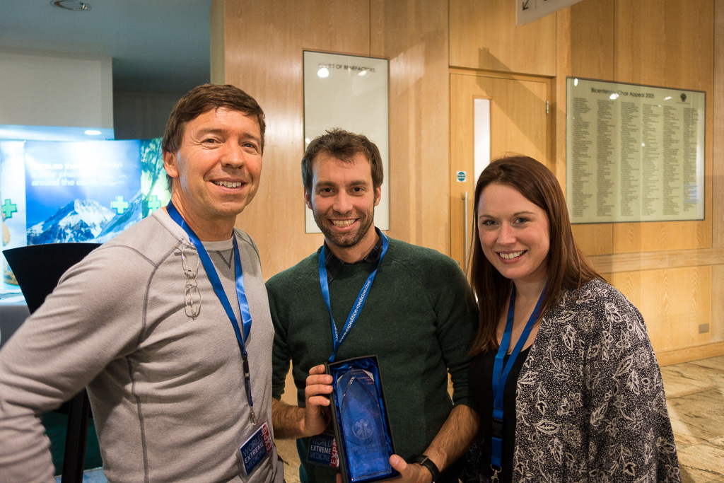 Astronaut Michael Barratt presents the Organisation of the Year Award to Matt Wilkes and Ellie Heath of Adventure Medic