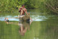 A local Malagasy man, paddling out in his pirogue to go fishing