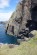 Climbers just visible at the base of Prophecy of Drowning