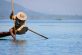 Intha fishermen are known across Asia for their ongoing use of traditional, sustainable fishing methods including spear fishing and traditional 'leg casting' techniques. In this picture, an Intha fisherman patiently waits to spear his catch on Inle Lake, Myanmar. 